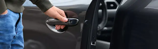 defective car door latch injury lawyer